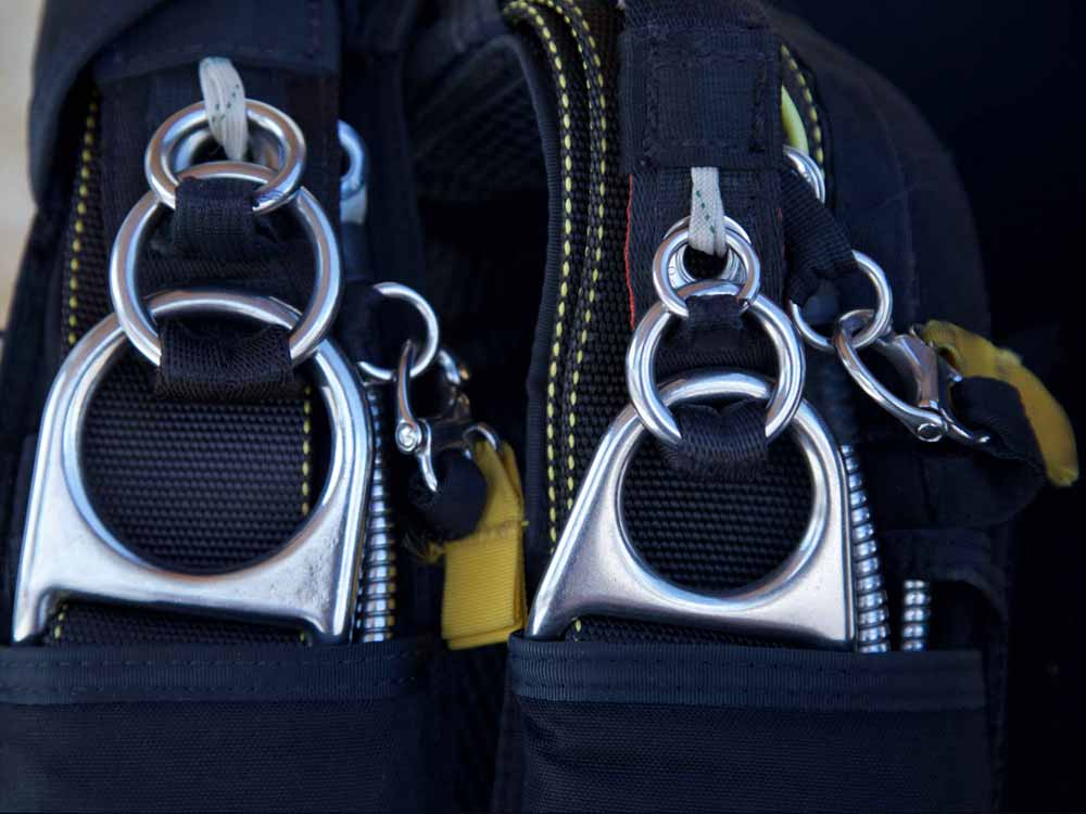 3-ring release system for cutaway Close-up of the 3-ring release system on a skydiving rig, part of the cutaway system.