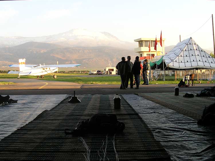 Morning at the dropzone View from the packing area of the aircraft and the mountains at the dropzone in Beni Mellal, Morocco.